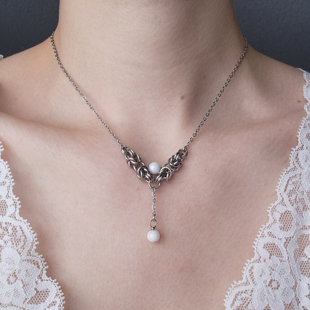 Angelic white pearl rosary necklace with a small silver chain